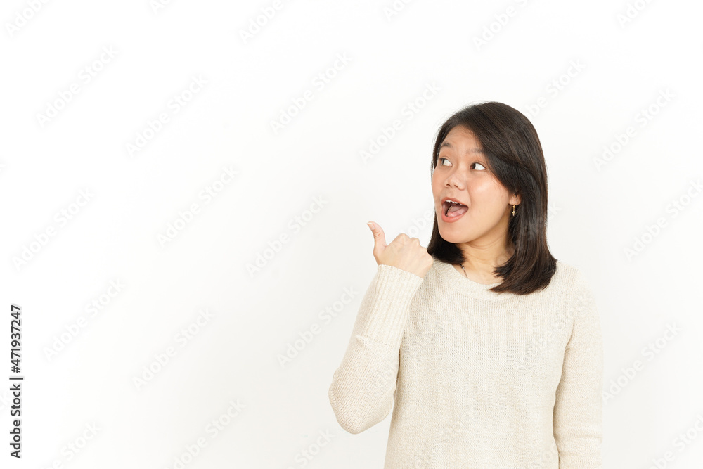Pointing aside and Showing Product of Beautiful Asian Woman Isolated On White Background Pointing aside and Showing Product of Beautiful Asian Woman Isolated On White Background