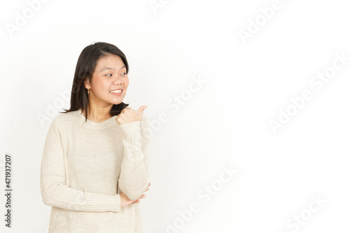 Pointing aside and Showing Product of Beautiful Asian Woman Isolated On White Background
