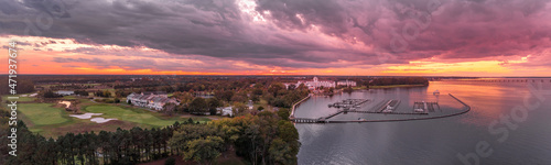 Colorful sunset over riverside resort in Cambridge Maryland USA photo