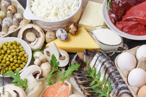 Healthy food, products containing vitamin D, beef meat, cow liver, quail eggs, butter, fish salmon mackerel, dairy products cottage cheese cream milk cheese, mushrooms champignons, green peas