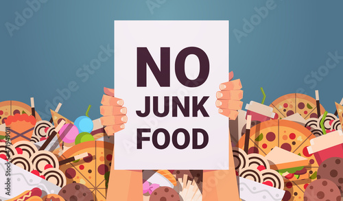 human hands holding no junk food placard unhealthy nutrition junkfood addiction stop fast food concept