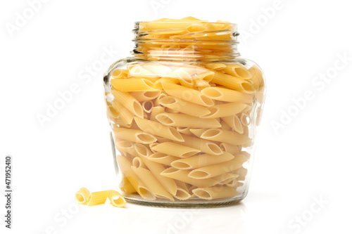 Italian pasta (Gomiti Rigati) on white background 