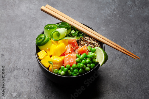 Poke bowl with salmon, cucumber and mango