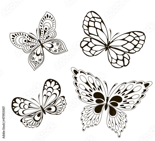 Vector background with the image set of black and white butterflies in the form of a tribal tattoo