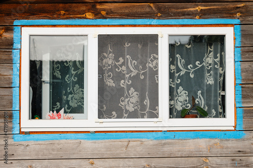 Canvastavla The window of a wooden farmhouse