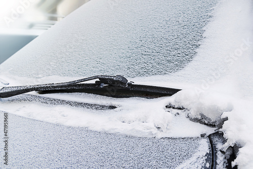 Ice on the windshield of the car. photo