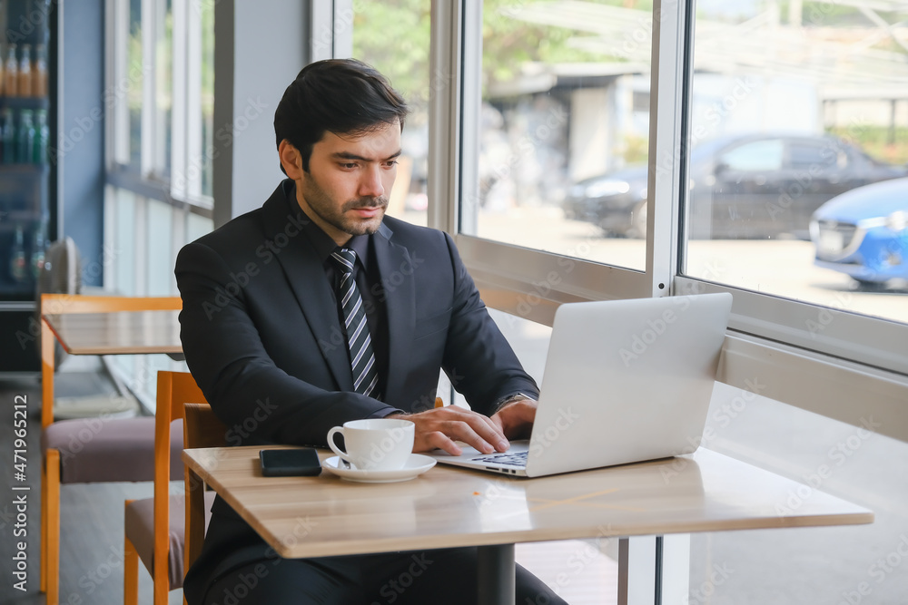 business caucasian man sitting in working in co working space business caucasian man sitting in working in co working space