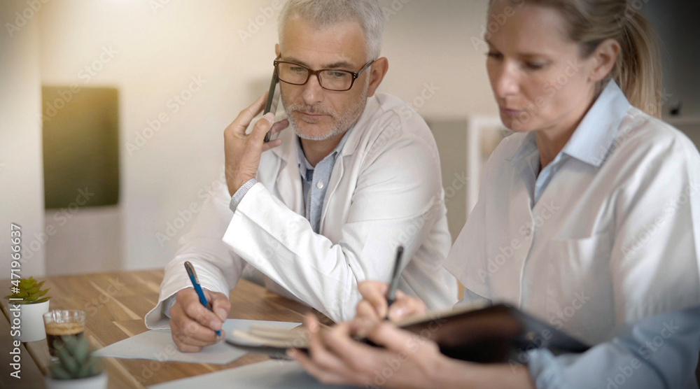 doctor on a work meeting in a meeting room in a hospital doctor on a work meeting in a meeting room in a hospital