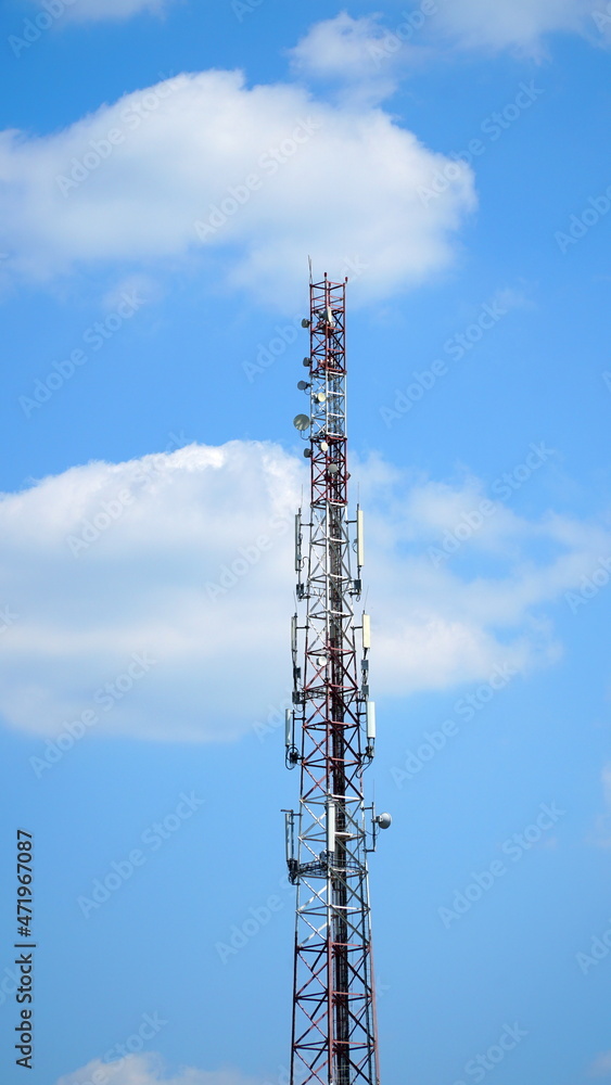 Technology on the top of the telecommunication GSM 5G, 4G, 3G tower.Cellular phone antennas on a building roof.silhouette of Telecommunication mast television antennas.