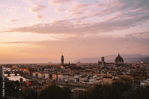 Golden sunset over Florence with the Duomo and the Ponte Vecchio. © Marten
