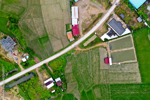 Scenic aerial view above the road and rice field