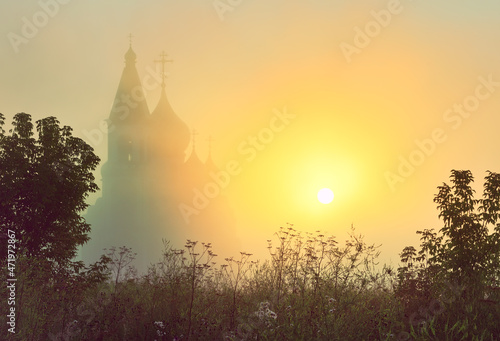 The temple in the fog at sunrise.