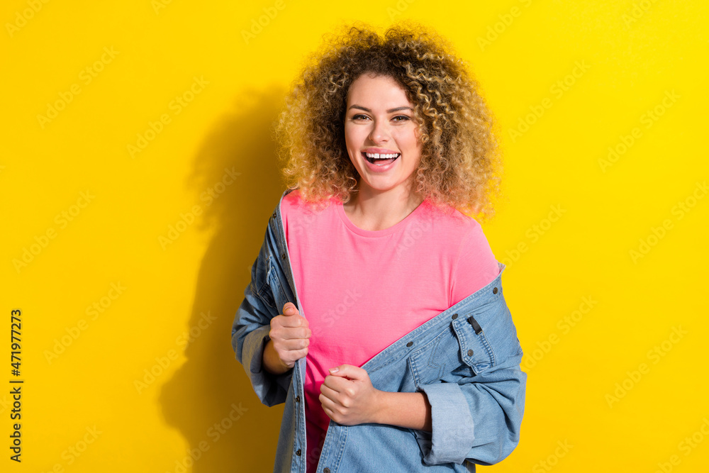 Photo of funny carefree lovely cute lady enjoy comfy outfit wear jeans jacket isolated yellow color background Photo of funny carefree lovely cute lady enjoy comfy outfit wear jeans jacket isolated yellow color background