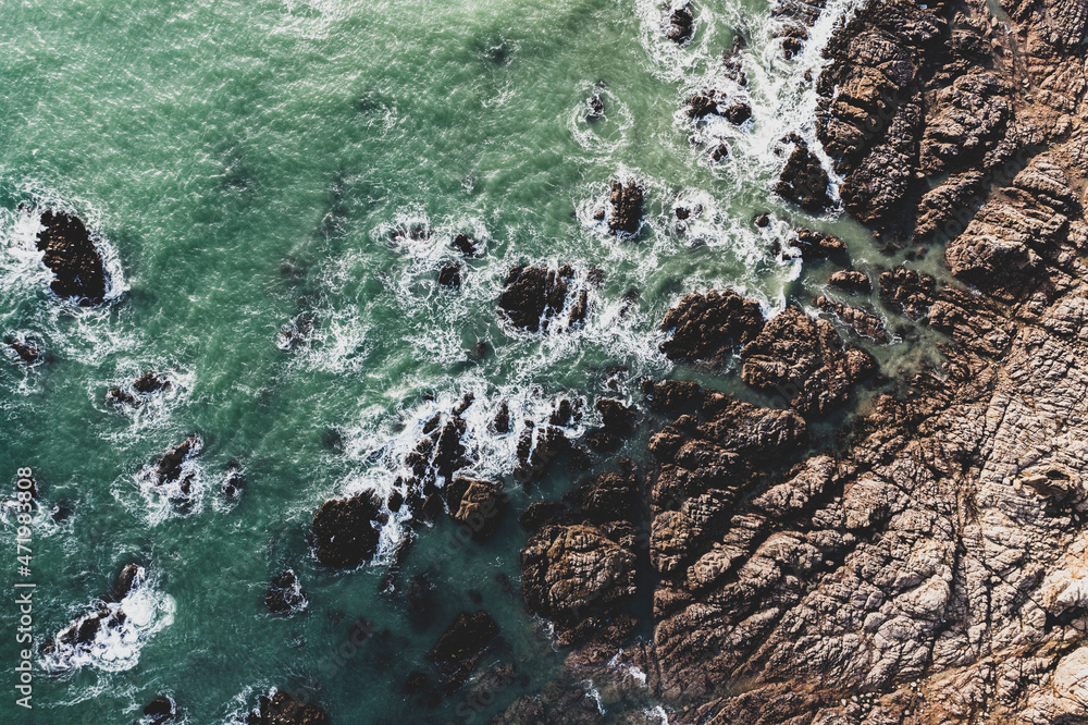 Obraz premium Sea landscape, drone view ocean coast, rocks and ocean in vintage tones..
