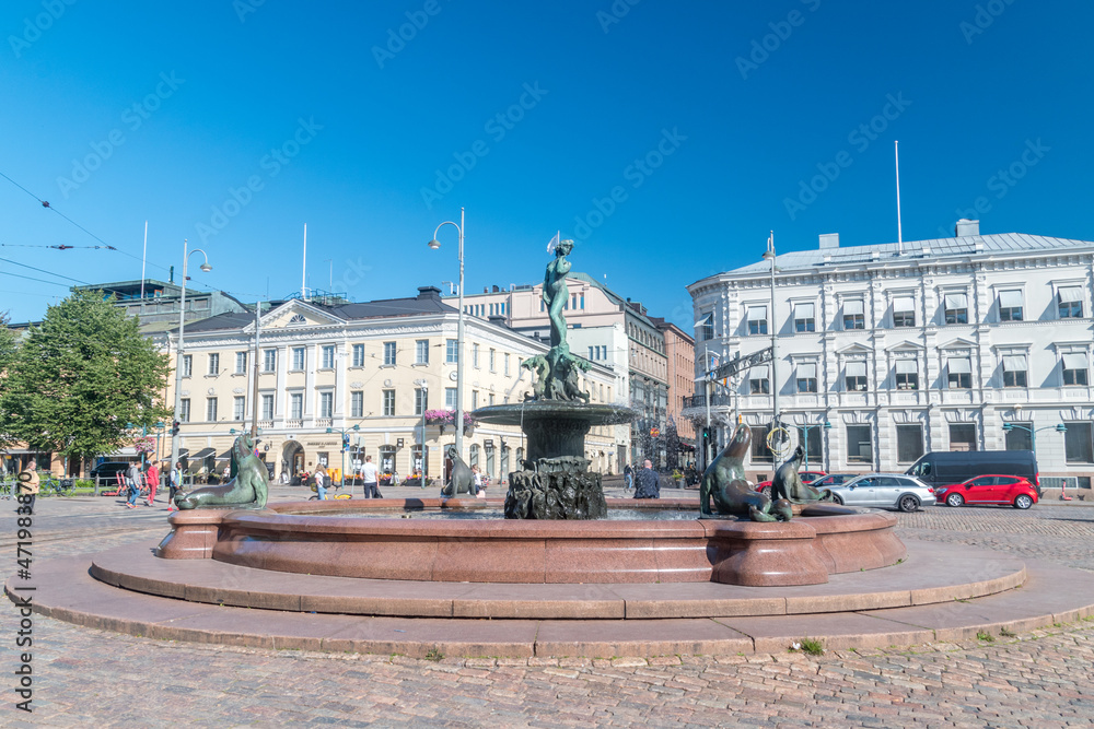 Helsinki, Finland - August 5, 2021: Havis Amanda on Market Square. Havis Amanda is a fountain and a statue in Helsinki, Finland by the sculptor Ville Vallgren.