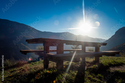 Picturesque perfect picnic table location at sunset in National park  photo