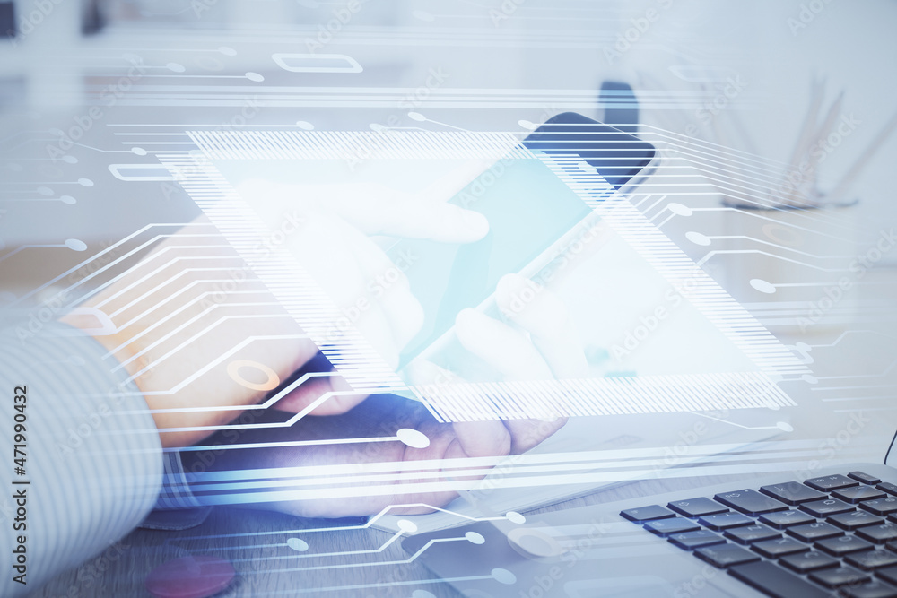 Double exposure of man's hand holding and using a digital device and data theme hologram drawing. Technology concept. Double exposure of man's hand holding and using a digital device and data theme hologram drawing. Technology concept.