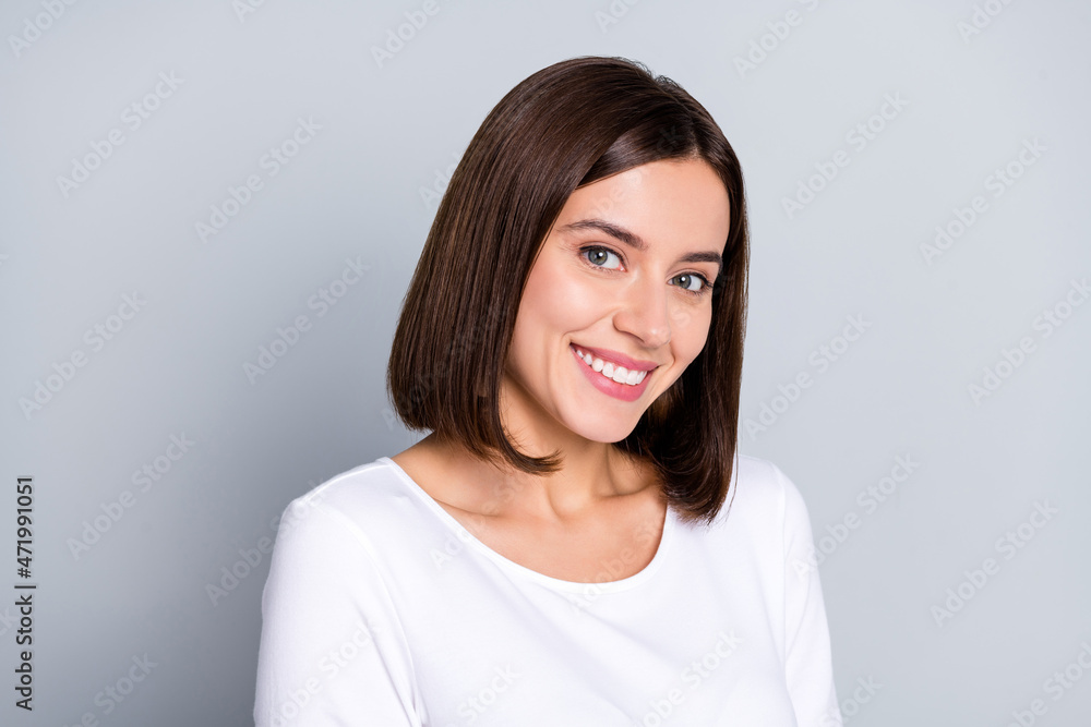 Photo of cute bob hairdo millennial lady wear white shirt isolated on grey color background Photo of cute bob hairdo millennial lady wear white shirt isolated on grey color background