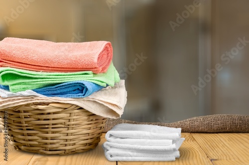 Stack of clean freshly laundered, neatly folded clothes