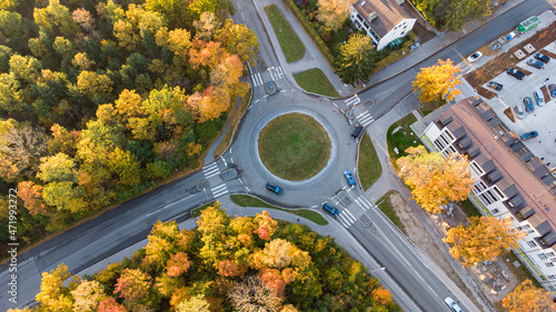 Aerial view of traffic in a roundabout next to a city in Germany photo