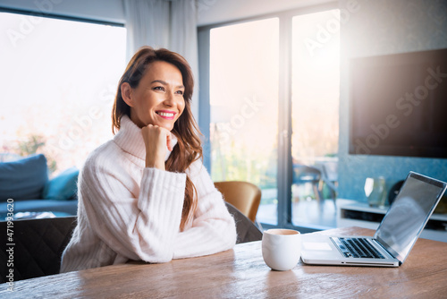 Wallpaper Mural Attractive woman sitting at desk and ready for working from home Torontodigital.ca