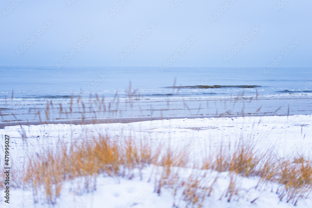 Winter landscape, snow on sea beach Winter landscape, snow on sea beach
