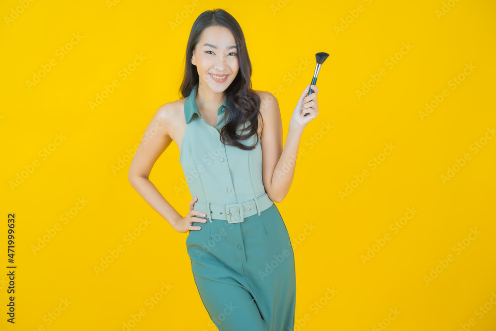 Portrait beautiful young asian woman with make up brush cosmetic Portrait beautiful young asian woman with make up brush cosmetic