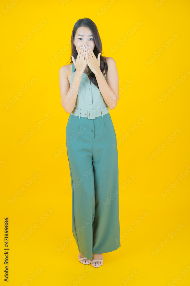 Portrait beautiful young asian woman smile with action Portrait beautiful young asian woman smile with action