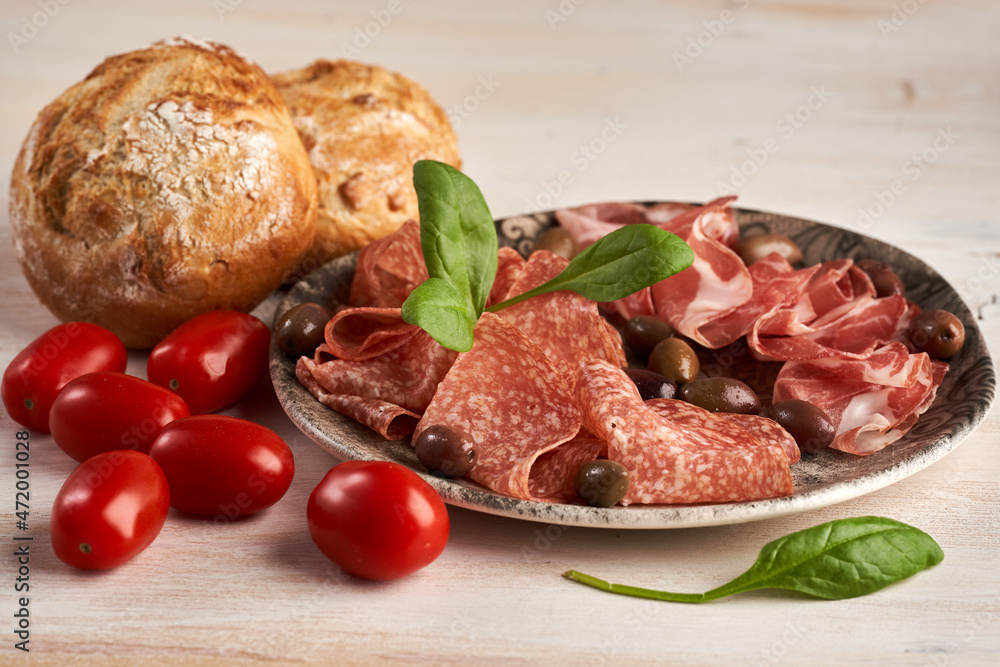 Cold cuts of ham and salami Cold cuts of ham and salami