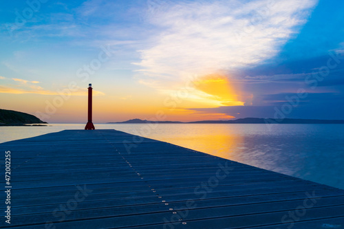 Scenic sunset at Is Solinas marina