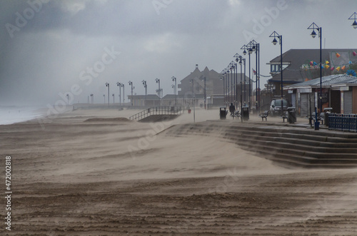 sand blowing from beach during storm