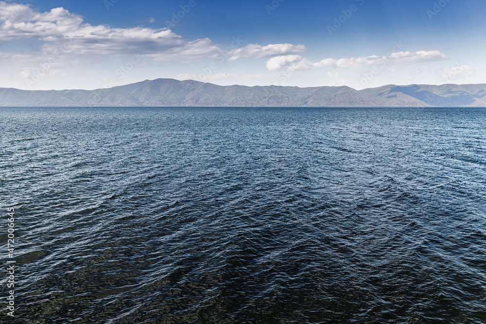 Idyllic landscape with famous Lake Sevan - one of the largest sources of fresh water in Armenia and the whole Transcaucasia. Idyllic landscape with famous Lake Sevan - one of the largest sources of fresh water in Armenia and the whole Transcaucasia.