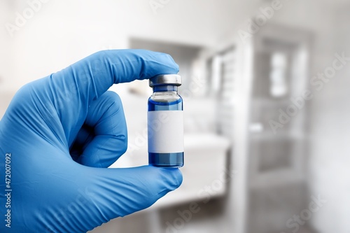 Fototapeta Naklejka Na Ścianę i Meble -  Vaccine bottles covid - 19 vials medicine and syringe injection