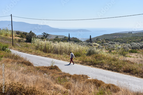 A Refugee Walking 8 Kilometers from the New Closed Zervou Refugee Camp in Samos, Greece to the Next Town, Vathy
