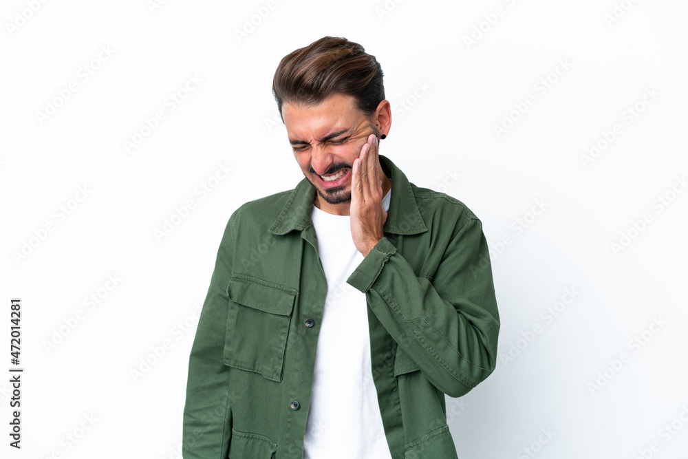 Young caucasian man isolated on white background with toothache Young caucasian man isolated on white background with toothache