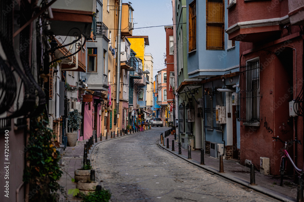 Istanbul, Turkey - November 08, 2021: Balat district of Istanbul. very popular Multicolored houses in row on the street in Istanbul