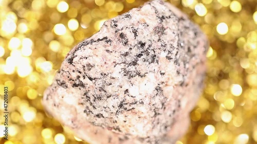 granite stone on a golden background.