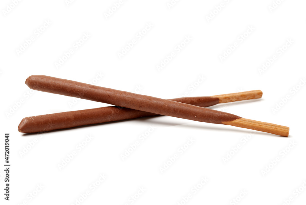 Breadsticks covered with chocolate on white background Breadsticks covered with chocolate on white background