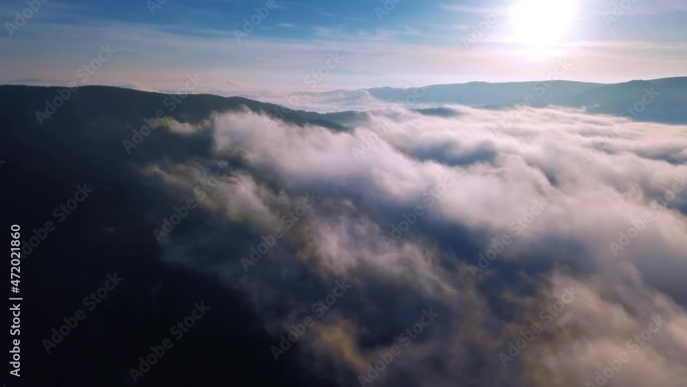 Fly above misty clouds sky, Aerial view of beautiful nature landscape in sunny autumn morning heaven 4K Fly above misty clouds sky, Aerial view of beautiful nature landscape in sunny autumn morning heaven 4K