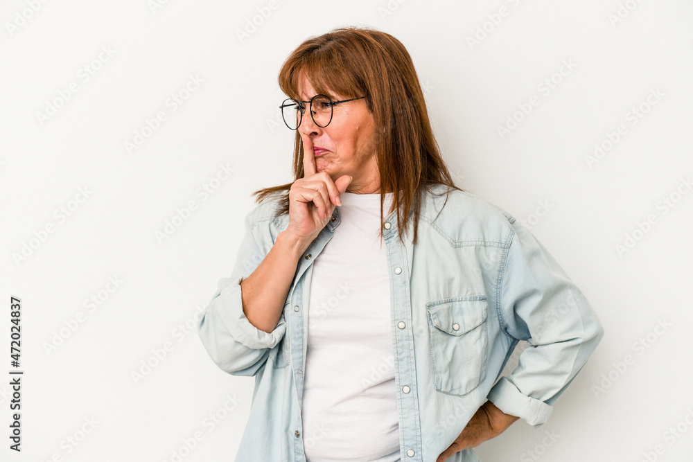 Middle age caucasian woman isolated on white background keeping a secret or asking for silence. Middle age caucasian woman isolated on white background keeping a secret or asking for silence.