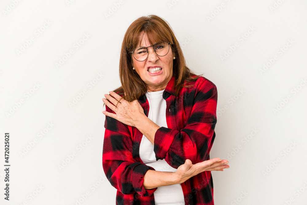 Middle age caucasian woman isolated on white background massaging elbow, suffering after a bad movement. Middle age caucasian woman isolated on white background massaging elbow, suffering after a bad movement.