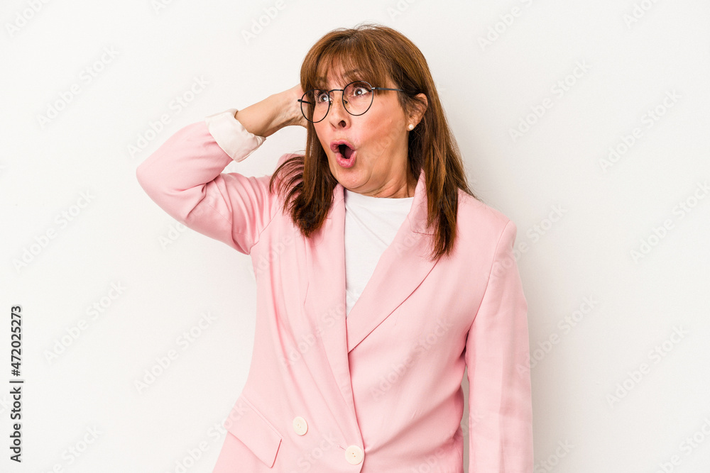 Middle age caucasian woman isolated on white background being shocked, she has remembered important meeting. Middle age caucasian woman isolated on white background being shocked, she has remembered important meeting.