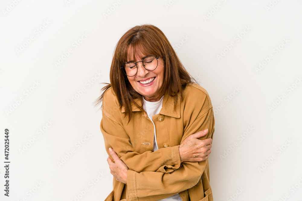 Middle age caucasian woman isolated on white background laughing and having fun.