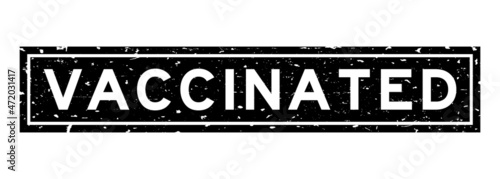 Grunge black vaccinated word square rubber seal stamp on white background