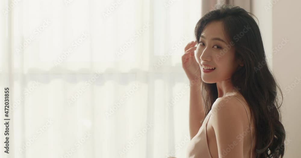 Happy young woman waking up in the morning,4K Happy young woman waking up in the morning,4K