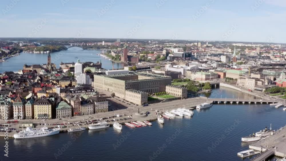Aerial view Stockholm Sweden. Pier with parked boats on the shores of the old town with historic buildings on the shores of the Baltic Sea. Aerial view Stockholm Sweden. Pier with parked boats on the shores of the old town with historic buildings on the shores of the Baltic Sea.