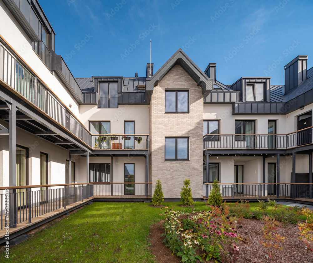 Fototapeta premium Yard of luxury residential townhouse. Modern architecture.