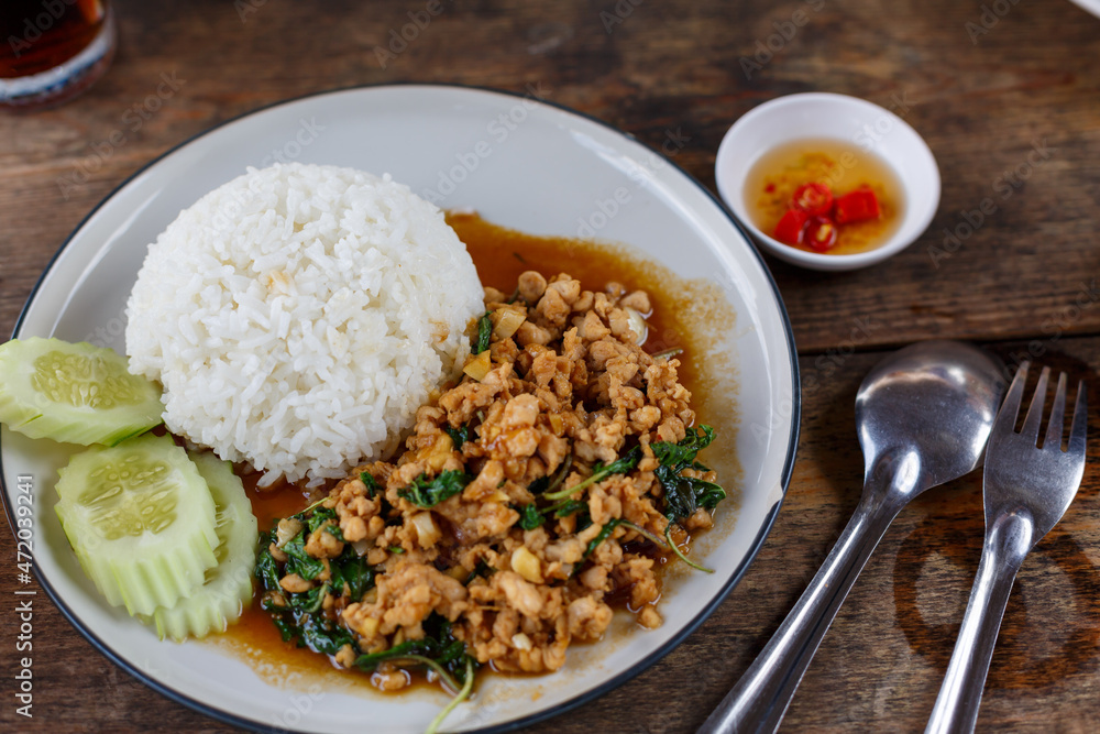 Minced pork basil with rice in Thai style Minced pork basil with rice in Thai style