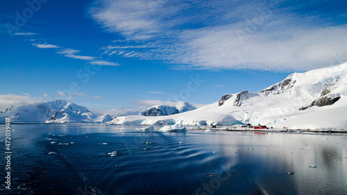 Ocean and Ice Landscapes with snow and icebergs from Paradise Bay in Antarctica.