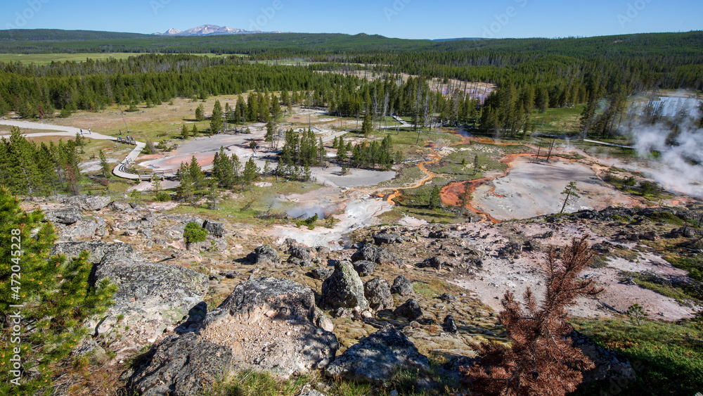 Artists Paint Pots and Blood Geyser hot spring overlook in summer, Yellowstone National Park Wyoming.